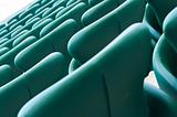 green empty seats at the stadium