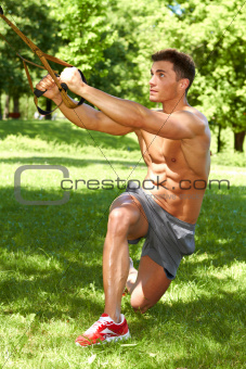 Handsome man doing exercises
