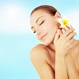 Woman enjoying day spa on the beach