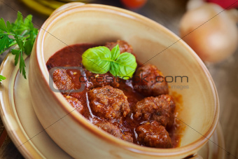 Italian cooking  - meat balls with basil