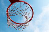 Basketball hoop on blue sky