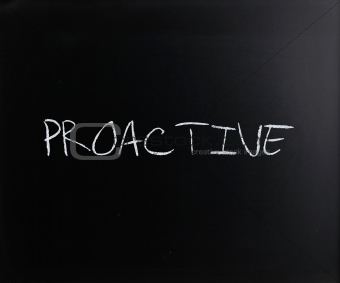 'Proactive' handwritten with white chalk on a blackboard