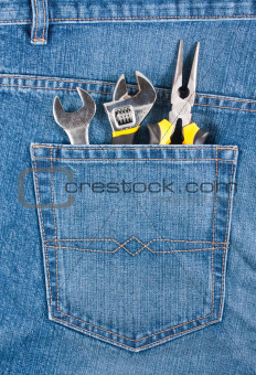 Several tools in jeans pocket