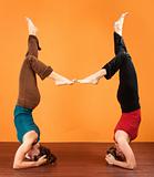 Two Ladies in Yoga Head Stands