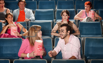 Loud Couple in Theater