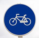 White bicycle sign in blue background. Road sign bicycle path.