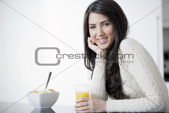 Young woman enjoying breakfast