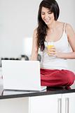 Young woman on laptop at home