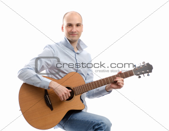 Young happy man with guitar