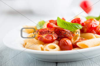 Penne pasta with cherry tomatoes