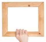 Wooden frame in hand