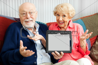 Senior Couple Confused by Tablet PC