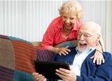 Tablet PC - Senior Couple Laughing