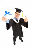 happy graduating student holding diploma  with thumbs up