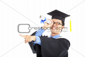 graduating student watching and pointing