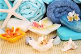 Towels, soaps, flower, candles
