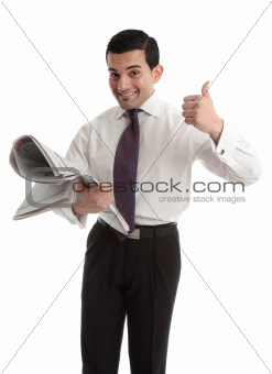 Businessman stockbroker with newspaper thumbs up