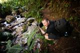 Photographer at a Stream