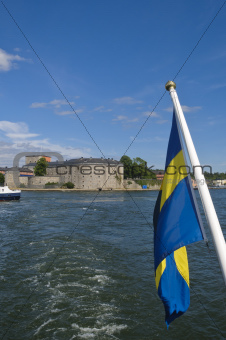 Vaxholm fortress and Swedish flag, Stockholm archipelago, Sweden