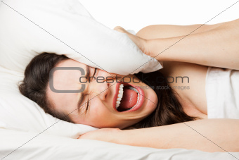 Frustrated woman trying to sleep