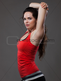 Attractive young woman stretching
