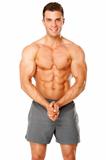Sporty and healthy muscular man isolated on white