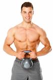 Fit muscular man exercising with dumbbell on white