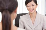 Asian Chinese Woman or Businesswoman in Office Meeting