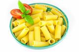 Bowl full of rigatoni pasta with tomatoes and basil