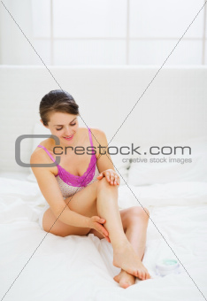 Self caring woman checking her perfect leg