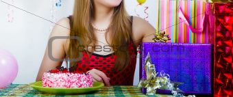Birthday. Girl with cake and gifts
