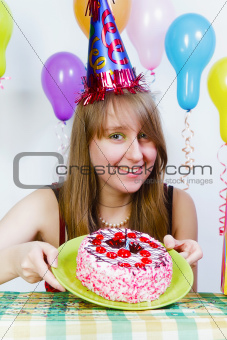 Birthday. A young attractive girl with cake