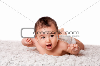 Cute baby laying on belly