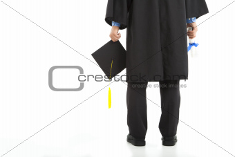 graduating  student holding diploma and cap