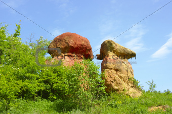 Red rocks in the shape of mushrooms