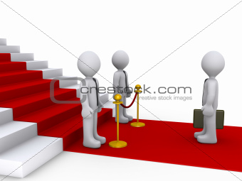 Businessman in front of stairs and two others are blocking his w