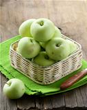 green ripe organic apples in the basket