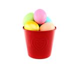 Colorful Easter eggs in a red bucket.