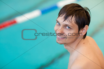 portrait of a man in a pool