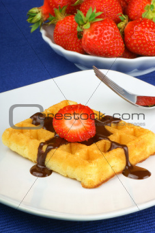 Waffle with chocolate and strawberry