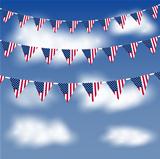 American flag bunting in a blue sky