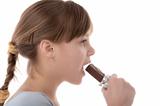 Girl eating chocolate bar