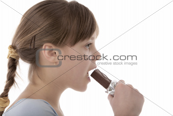 Girl eating chocolate bar