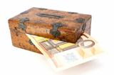 money partly in wooden box