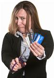Nervous Woman Cuts Credit Cards