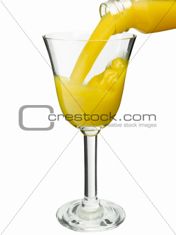 Pouring orange juice in a glass