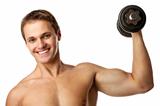 Muscular young man lifting a dumbbell over white background