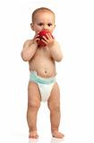 One-year old boy with red apple over white