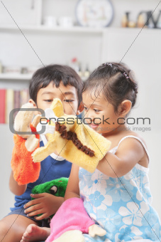 Children playing hand puppet
