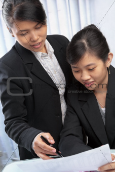 Two Asian businesswomen